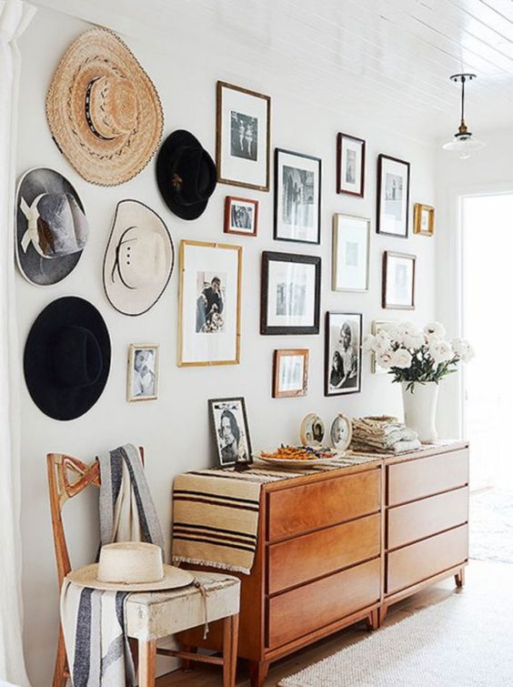 Feature wall with picture gallery and hats